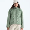 Reversibel Shasta-jakke med gennemgående lynlås til piger Reversibel Shasta-jakke med gennemgående lynlås til piger