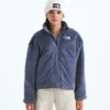 Reversibel Shasta-jakke med gennemgående lynlås til piger Reversibel Shasta-jakke med gennemgående lynlås til piger